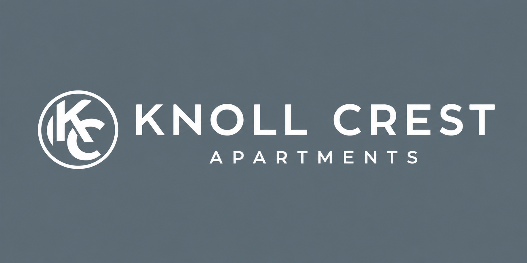 Property entrance sign with logo at Knoll Crest Apartments, San Antonio, TX